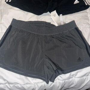 Brand new women’s Adidas running shorts. Never one still has the tag on them.